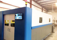 Tagliatrice del laser di CNC della fibra con la copertura FL-3015-3000W della Tabella di scambio di Auotomatic