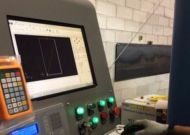 Tagliatrice del laser di CNC della fibra con la copertura FL-3015-3000W della Tabella di scambio di Auotomatic